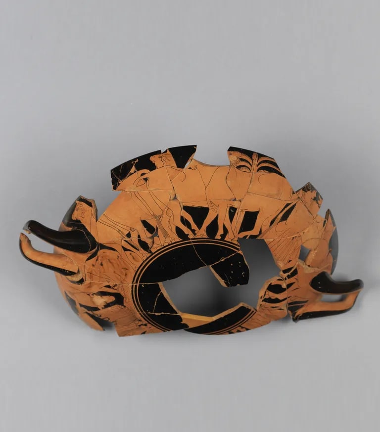 Fragments of a kylix (drinking cup) depicting Hermes with a bull (interior); Apollo recovering his cows (A); Maia and the baby Hermes (B)