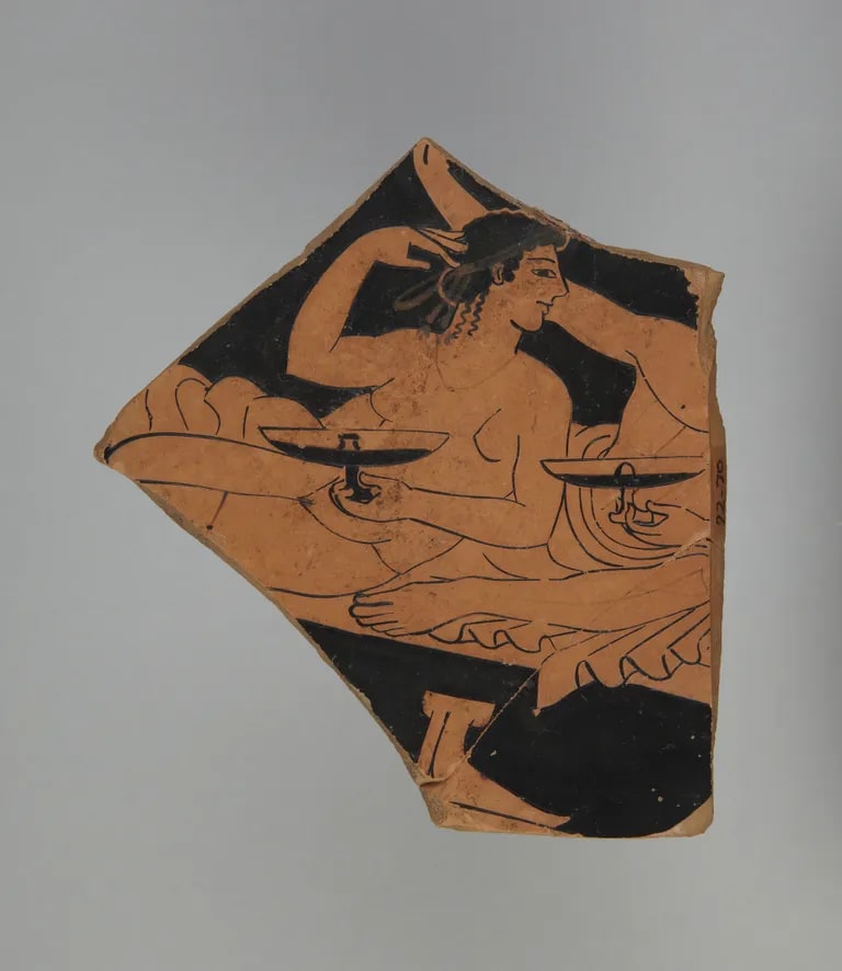 Fragment of a kylix (drinking cup) depicting a hetaira and youth reclining