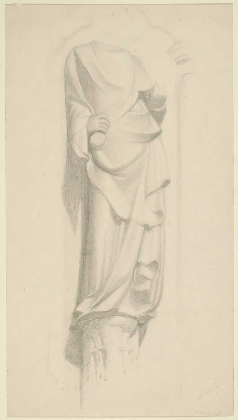 Sculpture of draped apostle standing on column, in niche