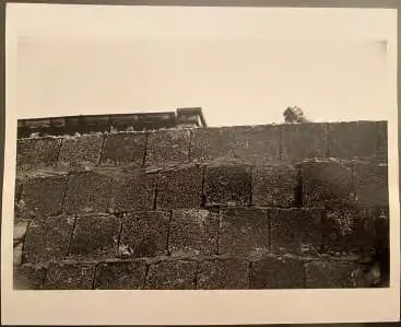 East German Reaching Over the Berlin Wall