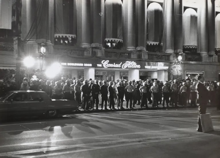 Police guarding Hilton Hotel from Yippie demonstrators, 1968 Democratic National Convention
