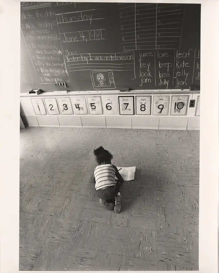 Margarita on the schoolroom floor, Reading, Pennsylvania, bilingual education program