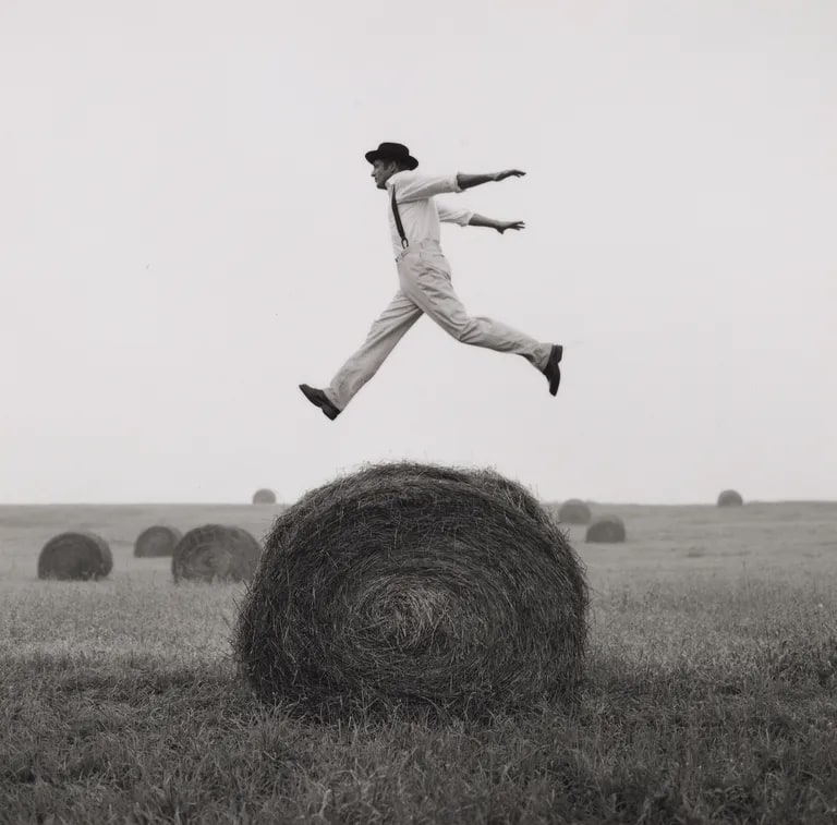 Don jumping over hay roll no. 1, Monkton, Maryland