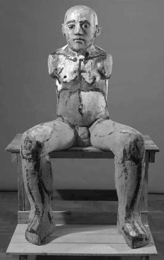Seated Armless Figure