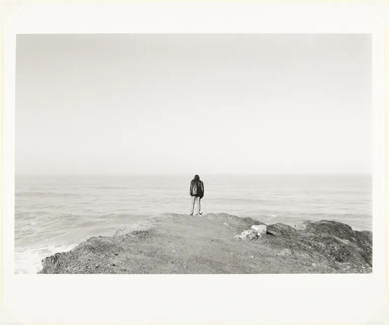 Man Looking at the Edge. The Pacific Ocean (Artist Timothy Berry)