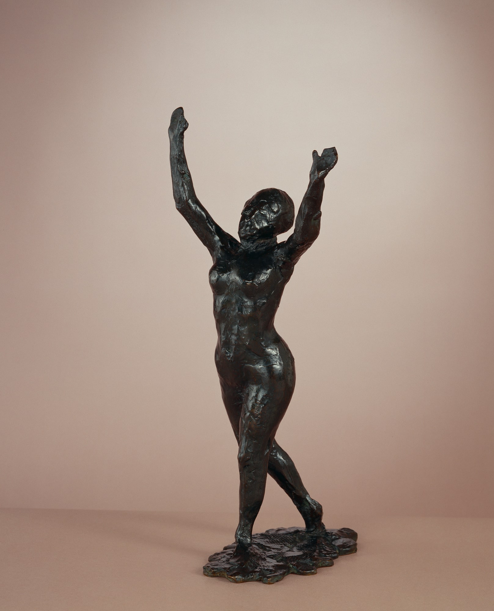 Dancer Moving Forward, Arms Raised