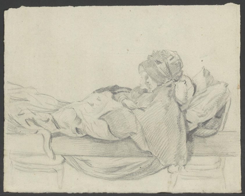 Slapende vrouw in bed
