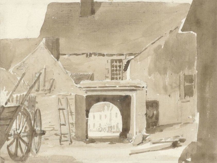 Inrit van een groot dorpshuis, van de binnenhof uit gezien