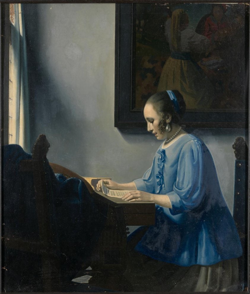 Woman Reading Sheet Music