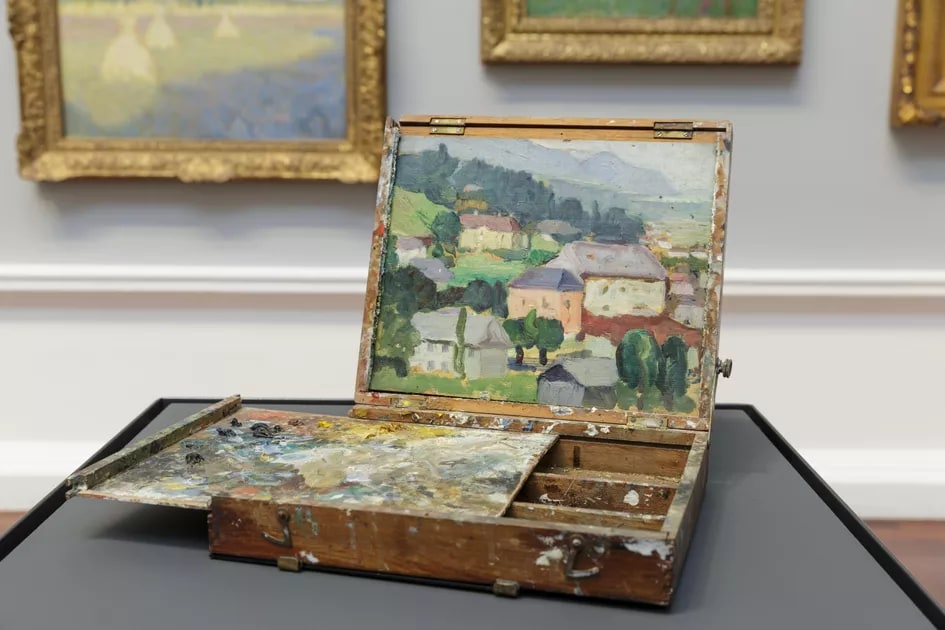 Artist’s paint box with French coastal landscape