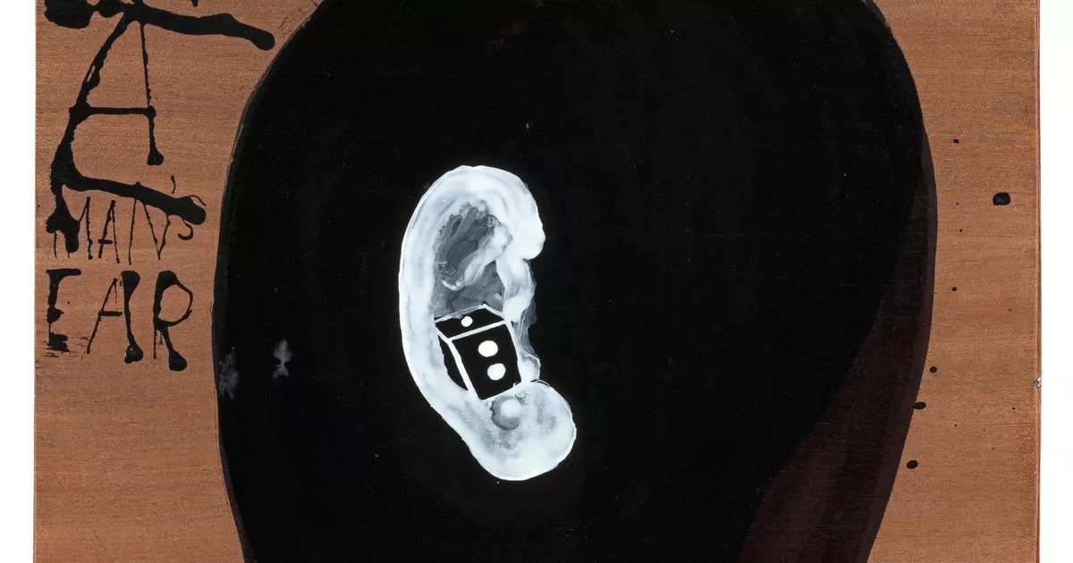 Dice in a man's ear