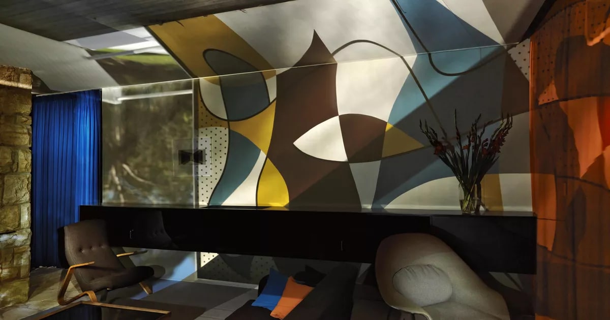Living room Rose Seidler House with exterior mural
