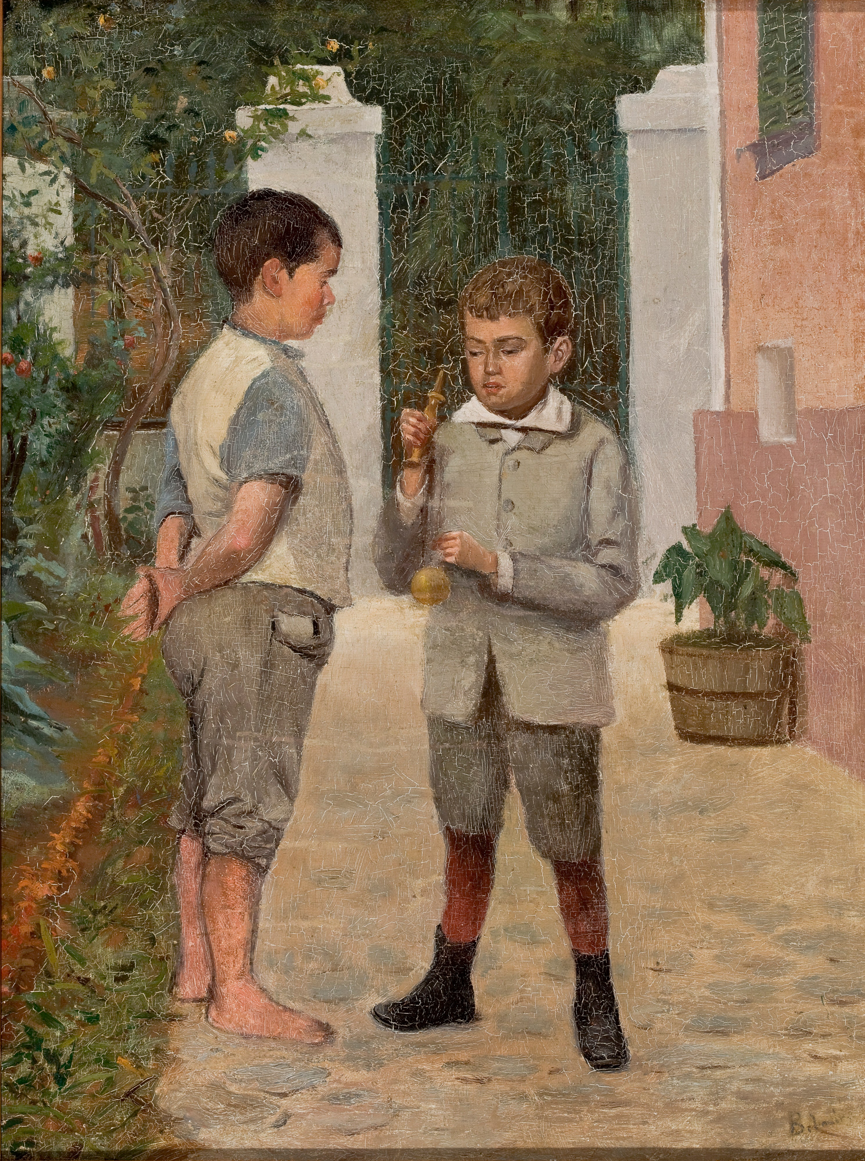 Dois meninos jogando bilboquê