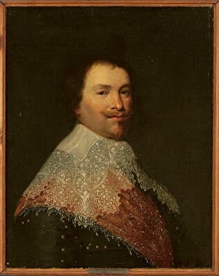 Portrait of a man with a lacy collar
