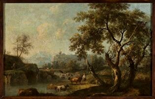 Mountain landscape with cattle at the waterhole