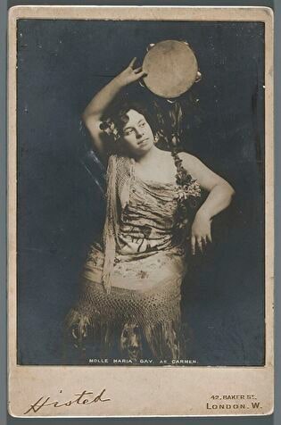 Portrait of Maria Gay (1879-1943), singer, as Carmen in the opera by Georges Bizet (view from the knees upwards)