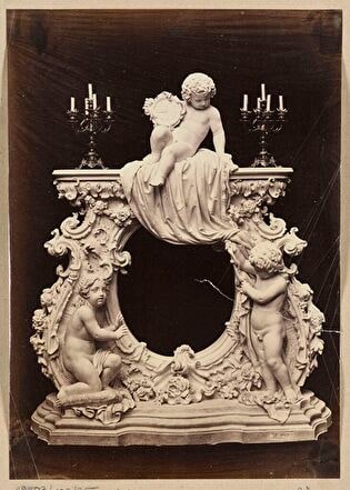 Portrait of a sculpture by Wiktor Brodzki depicting Neo-Rococo fireplace frame with three putti (fireplace decoration at Tsarskoye Selo?)