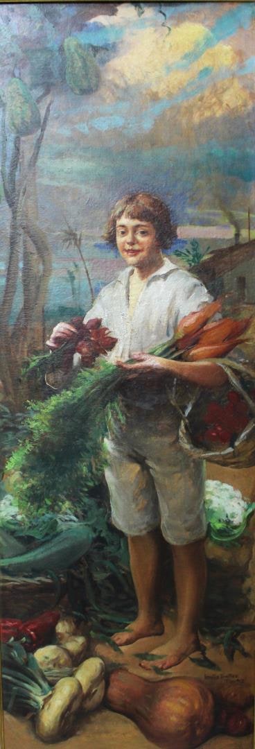 Menino com legumes