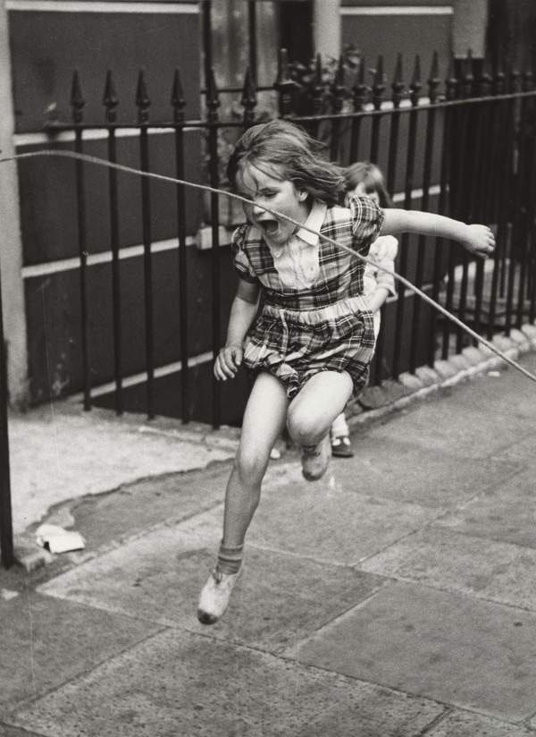 Girls playing in the street, London