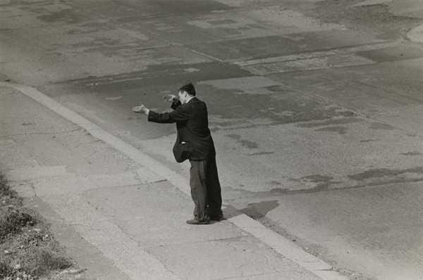 Man Gesturing in Demolished Street (Byker)