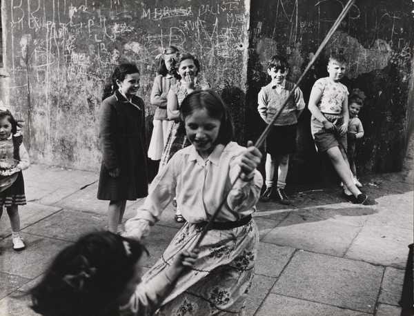 Girls swinging on a rope, Southam Street