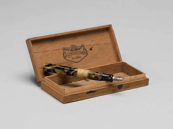 ‘Fountain pen, stored in a Carabena tobacco box