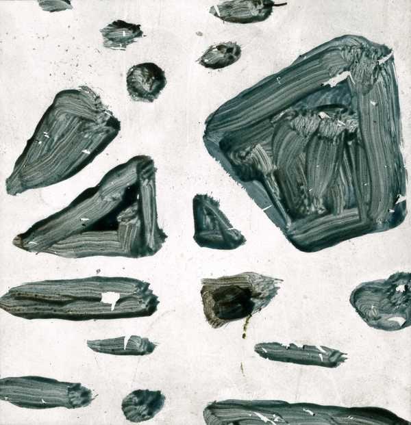 ‘Glass slide on which shapes have been painted in blue paint