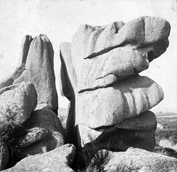 ‘Black and white glass lantern slide of rocks at Ploumanach