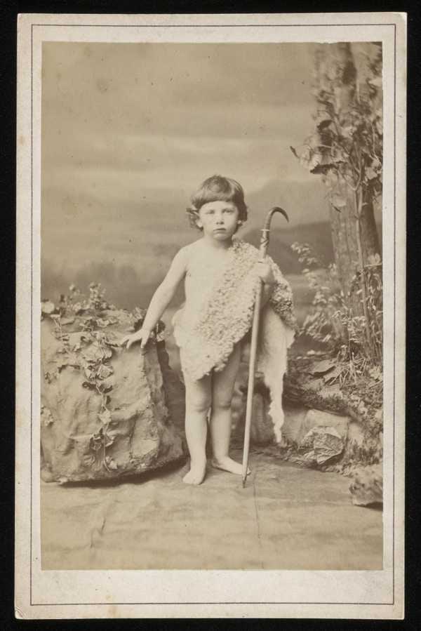 ‘Photograph of Edmund von Motesiczky as a child standing by a boulder dressed in a sheepskin toga holding a shepherd’s crook