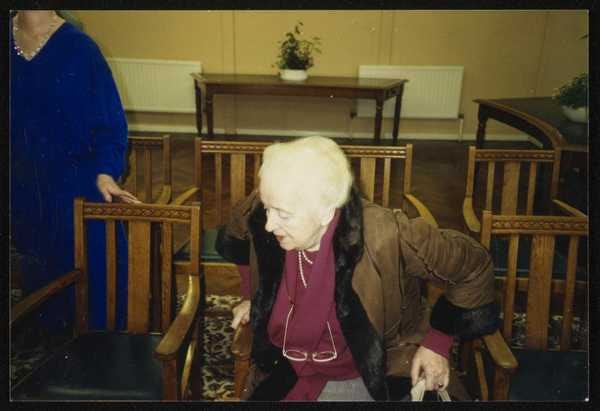‘Photograph of Marie-Louise von Motesiczky rising from a chair at the wedding of Peter and Jantien Black