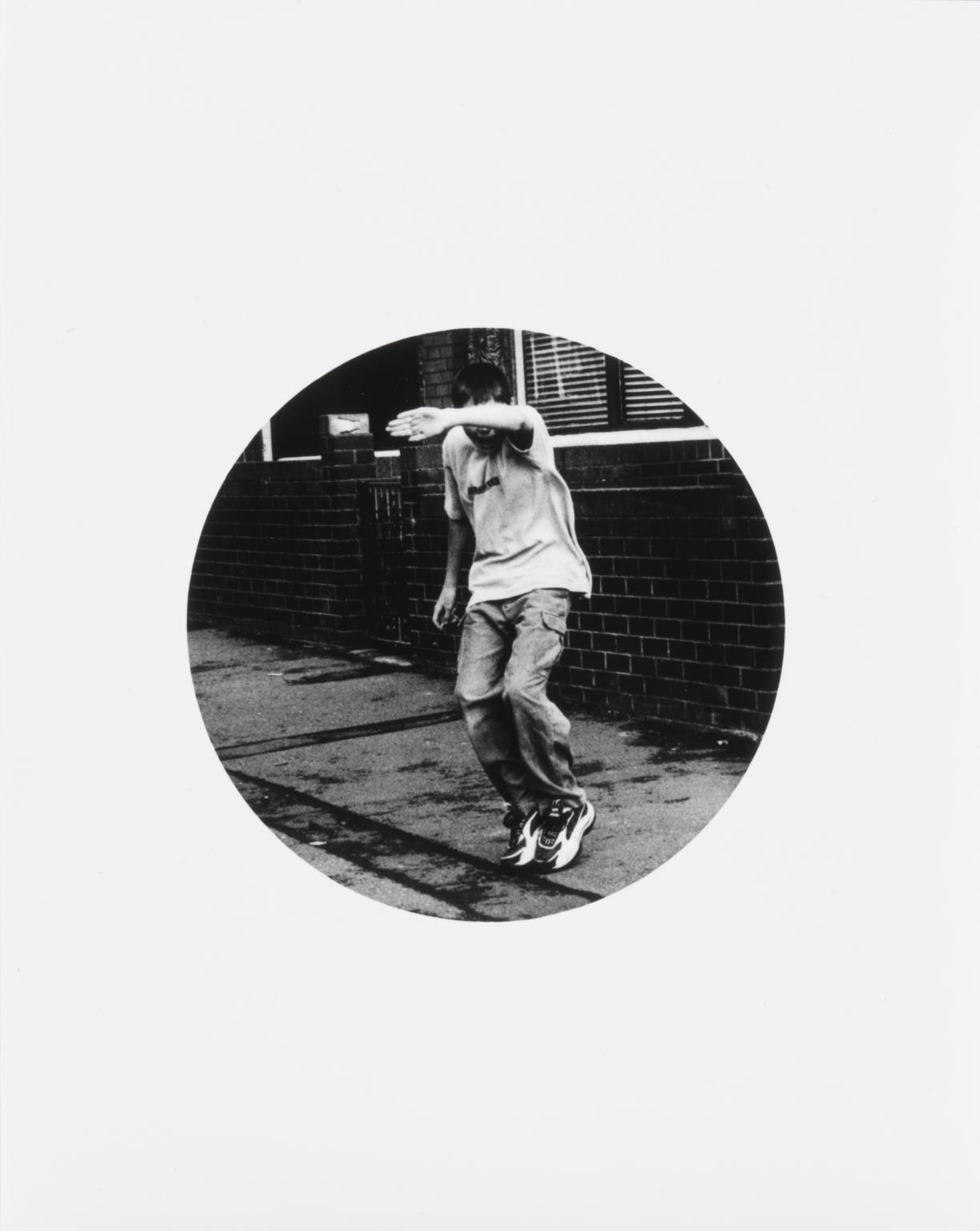 Untitled (Boy on tip toes)