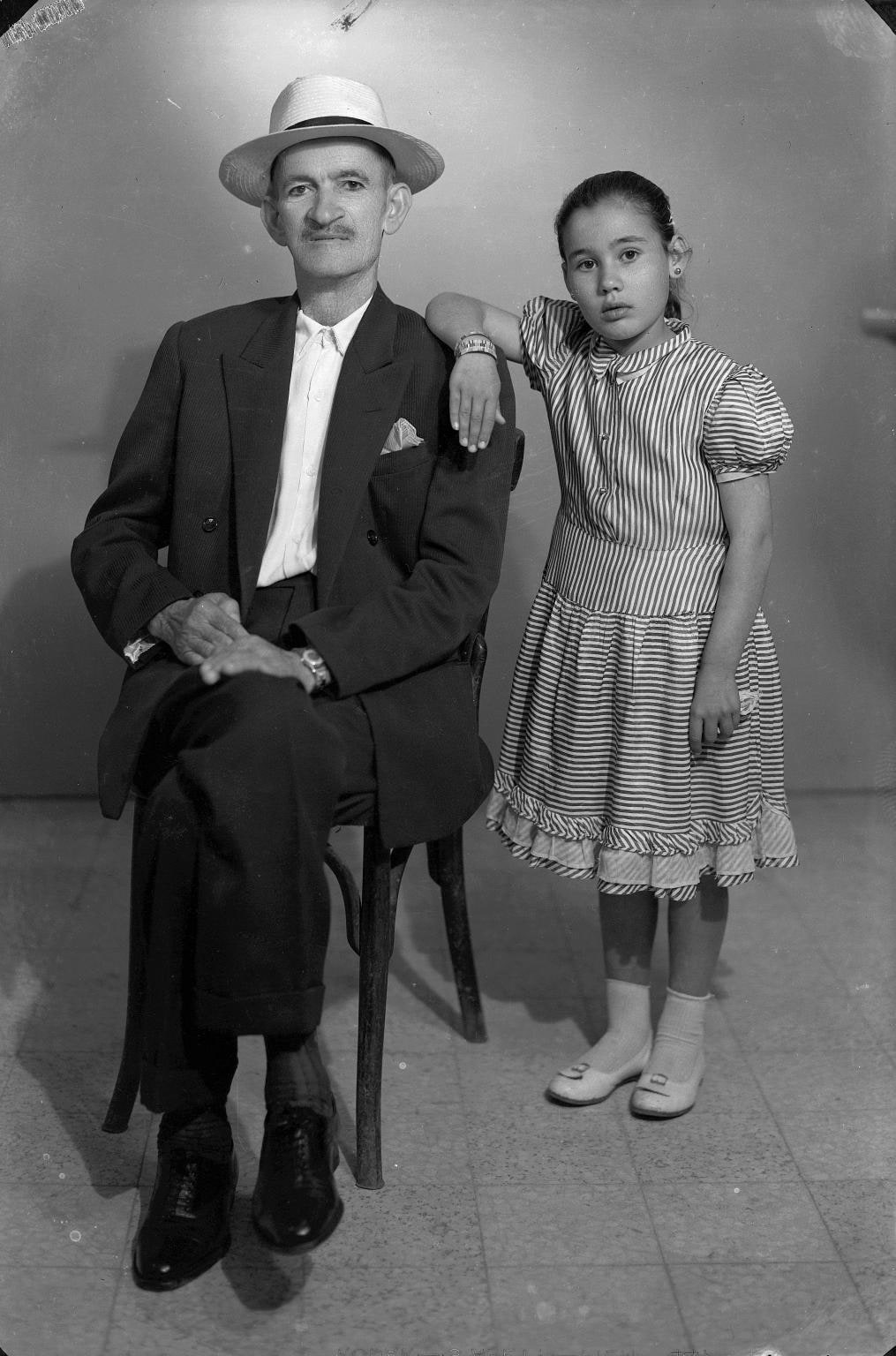 A man from Ghazieh and his daughter. Studio Shehrazade, Saida, Lebanon, late 1950s. Hashem el Madani