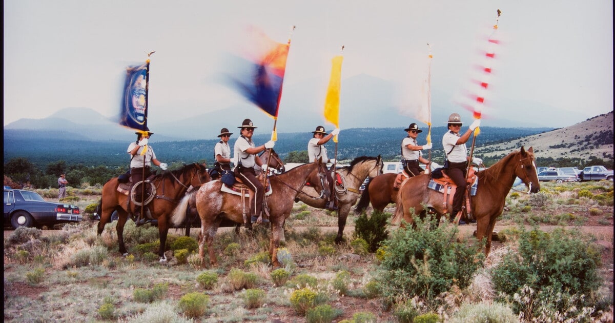 Navajo Tribal Police Presenting Colors at Celebration of Lease-Purchase of Sacred Mountain Land, San Francisco Peak, Arizona, 1986