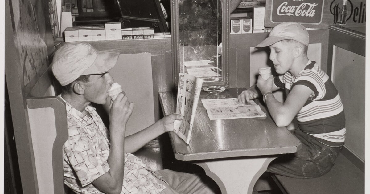 [Boys eating ice cream in drug store, Alabama]