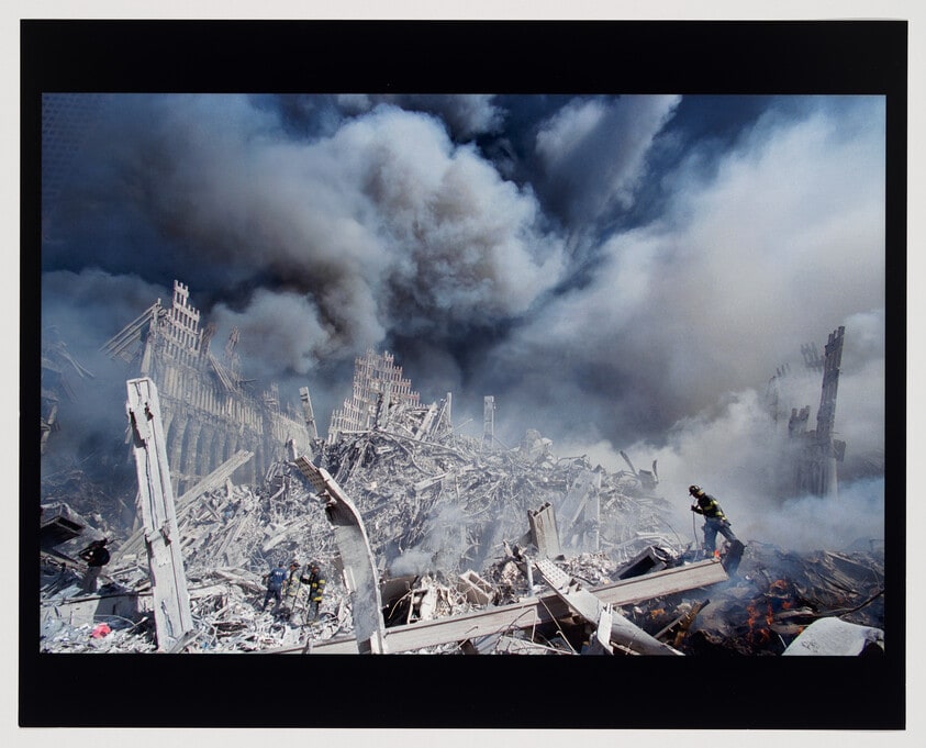 September 11, 2001 (Ground zero pile, smoke, one firefighter)