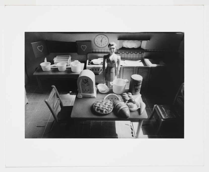 Woman/Purple Dress/Kitchen