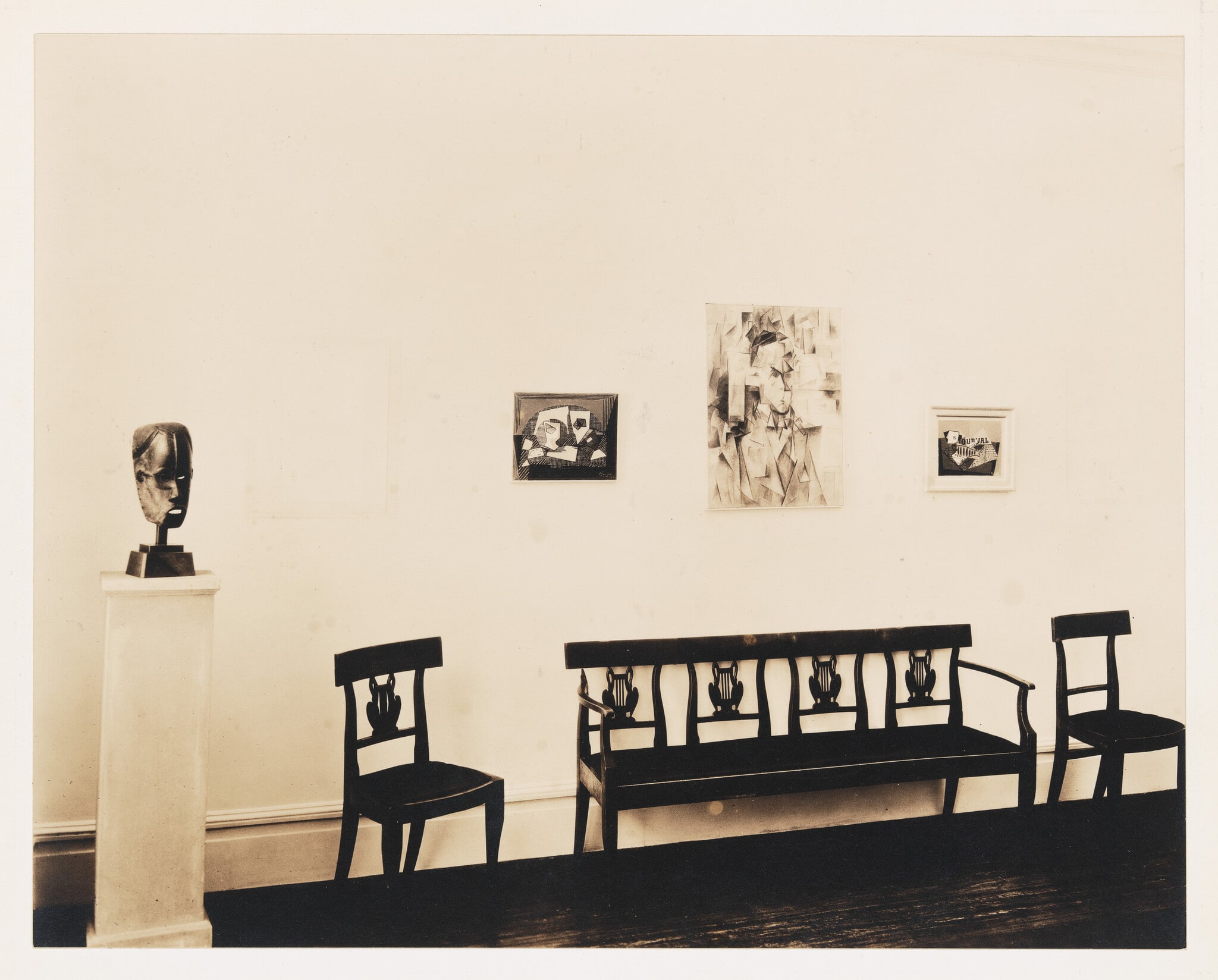 Installation view of Whitney Studio Club Exhibition "Recent Paintings by Pablo Picasso and Negro Sculpture"