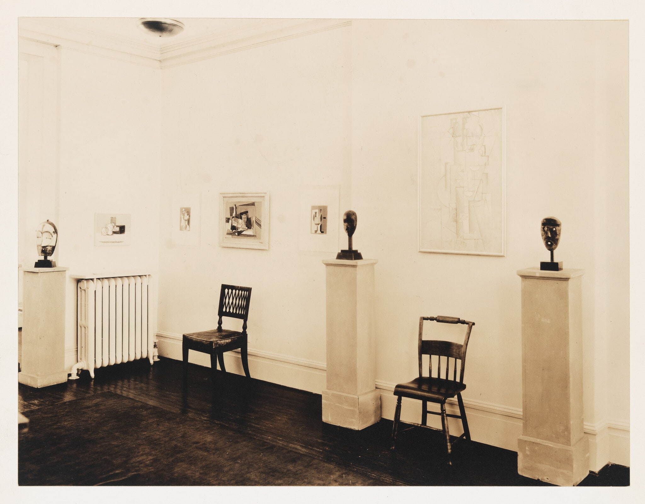 Installation view of Whitney Studio Club Exhibition "Recent Paintings by Pablo Picasso and Negro Sculpture"