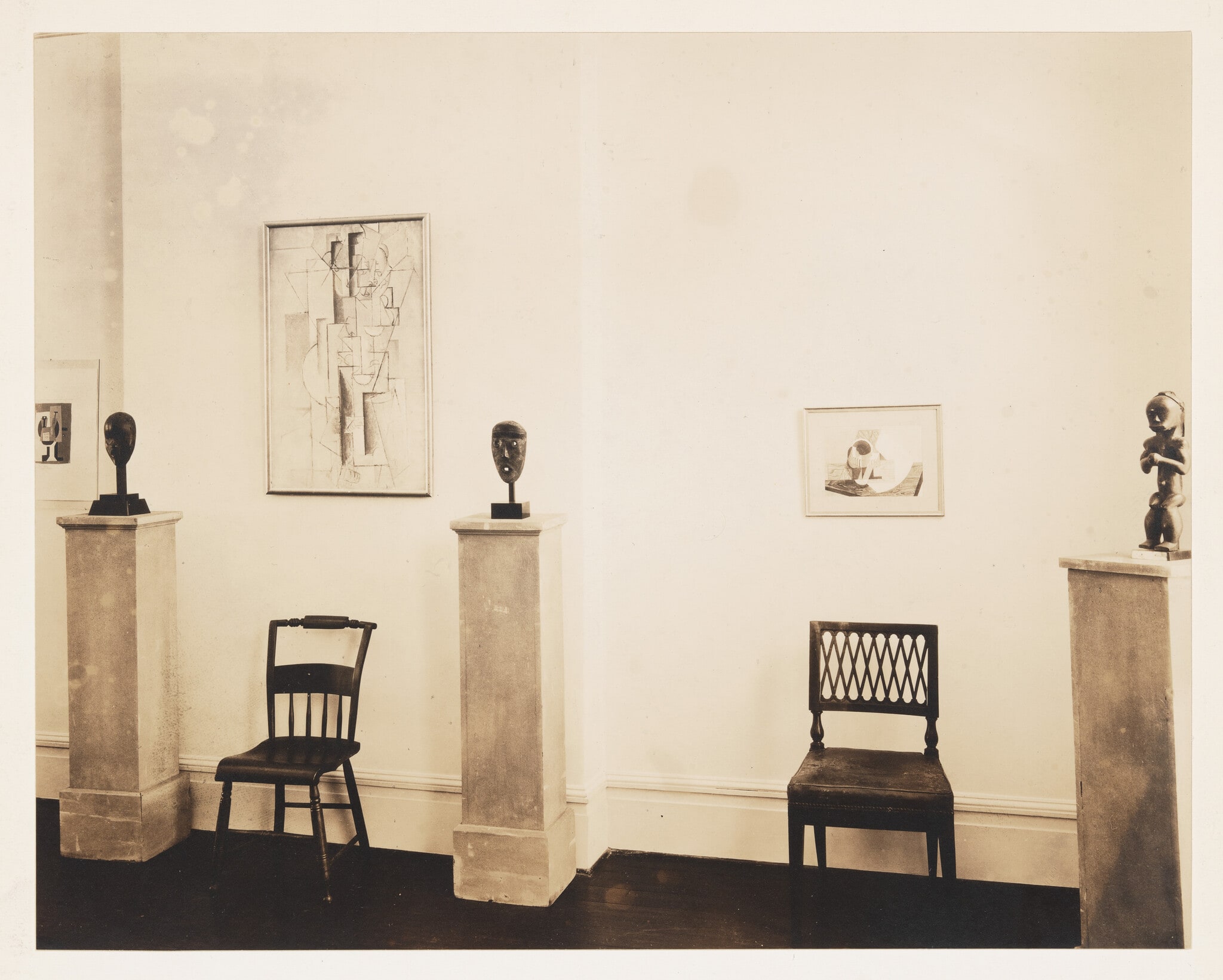 Installation view of Whitney Studio Club Exhibition "Recent Paintings by Pablo Picasso and Negro Sculpture"