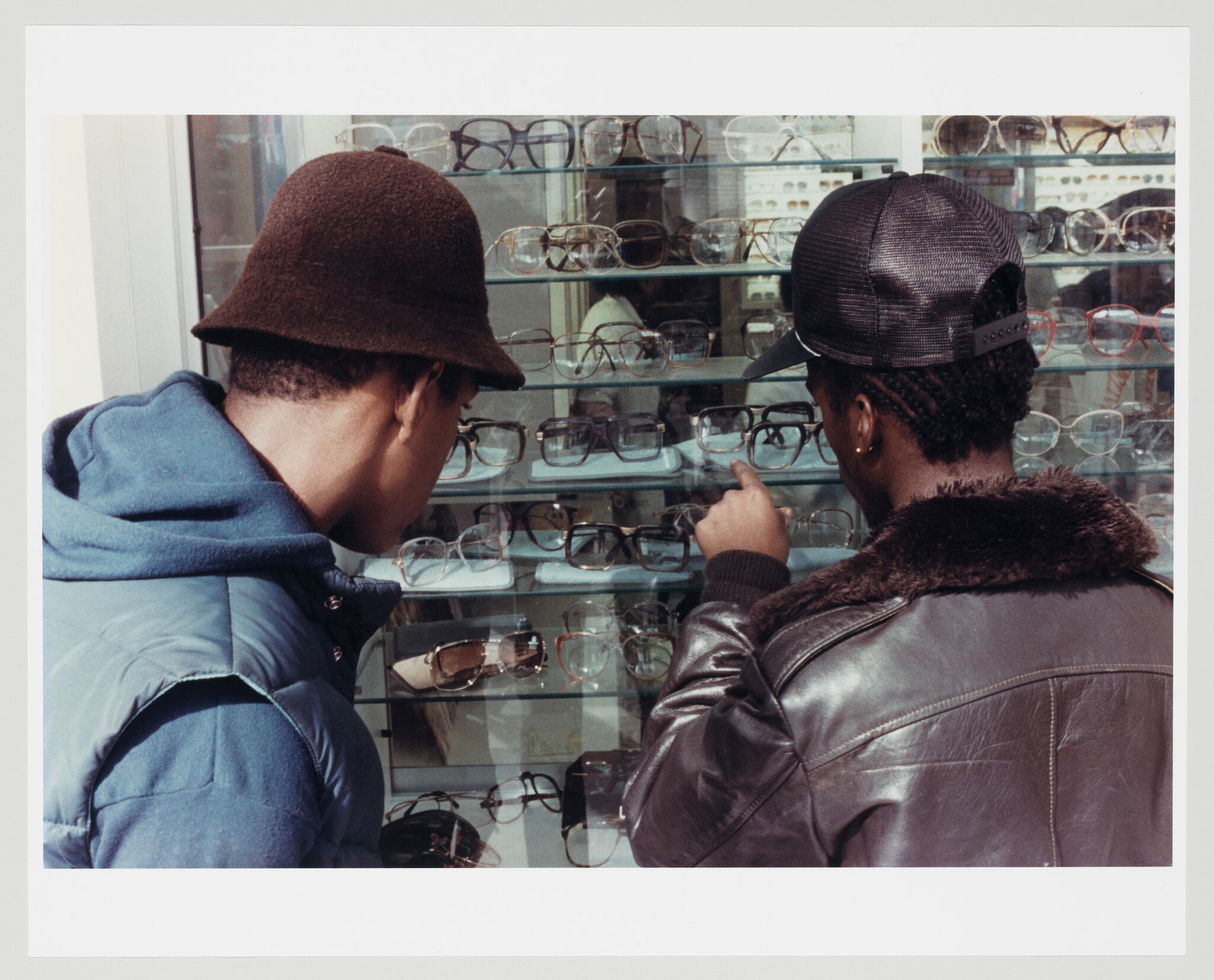 Untitled (Two Guys Looking at Sunglasses)
