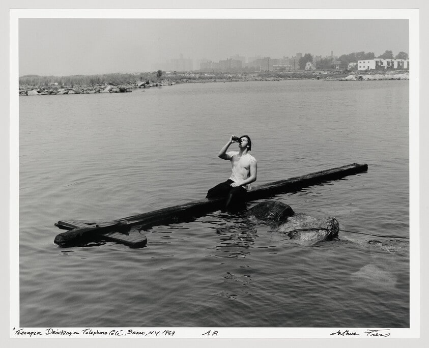 Teenager Drinking on Telephone Pole, Bronx, N.Y.