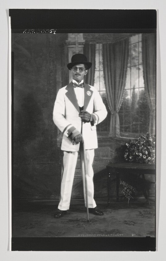 (Man in White Suit)