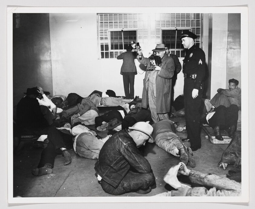 Untitled (Weegee in holding cell)