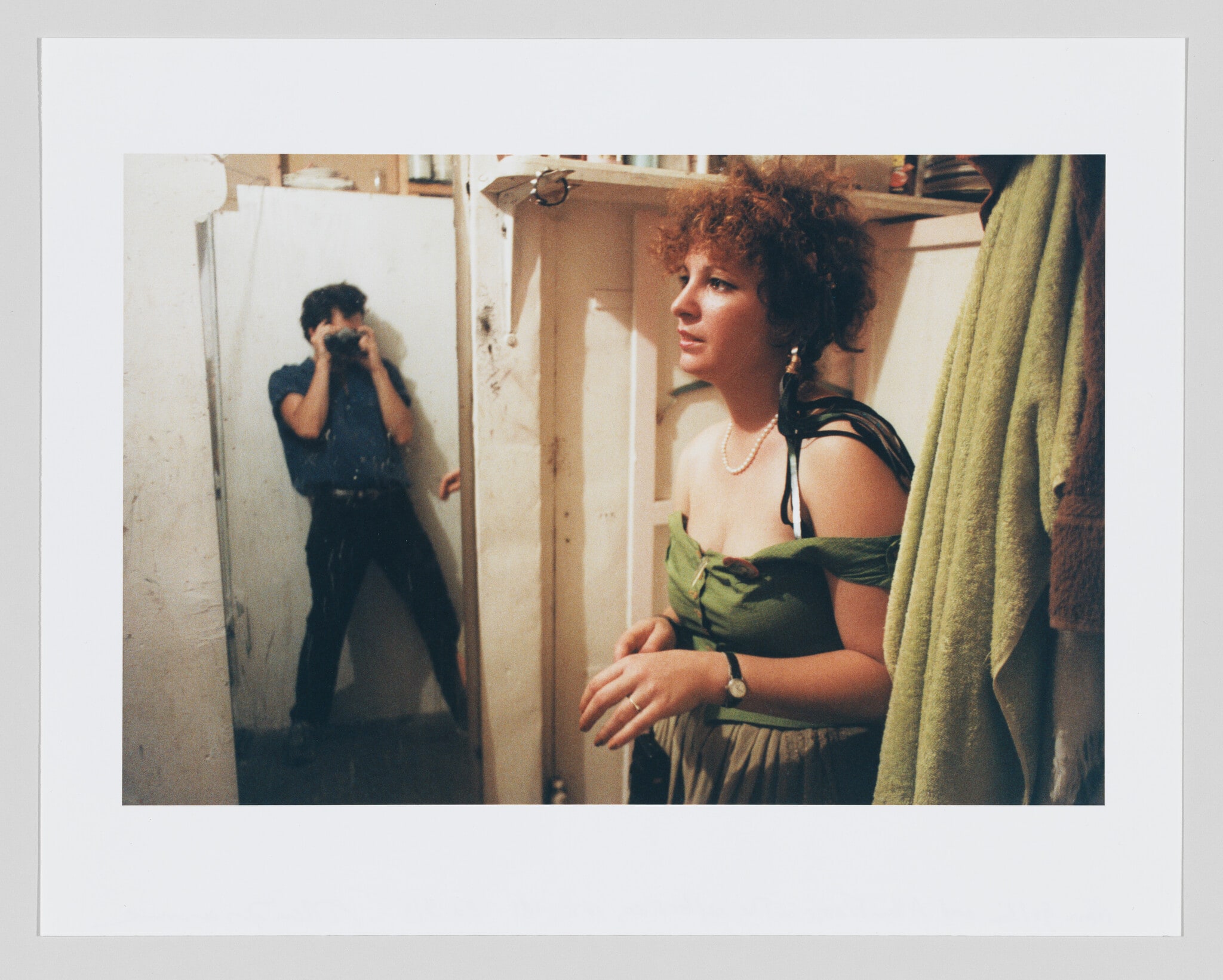 Nan Goldin and Allen Frame in the reflection, NYC