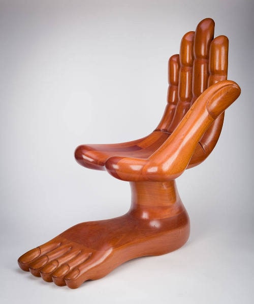 Chair in the form of a hand and a foot