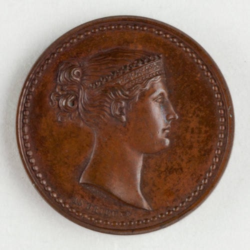 Head of Woman Coin