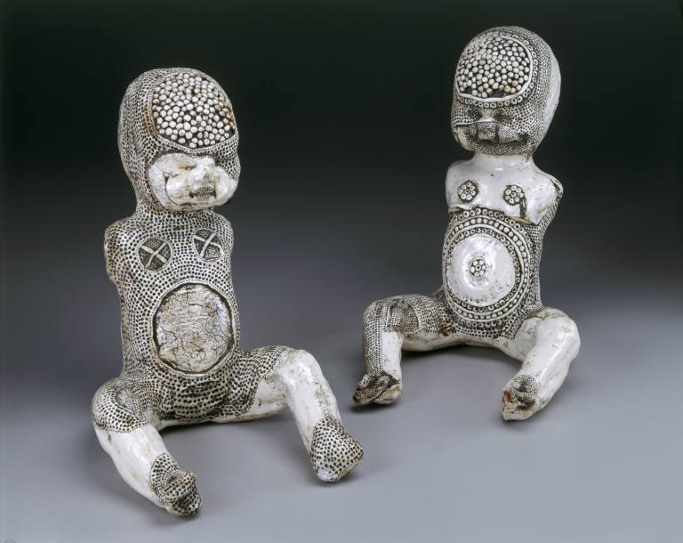Two Tattooed Baby Dolls