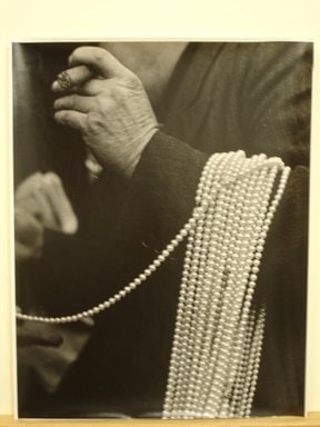 Man with Pearls over His Arm, Lower East Side, New York City