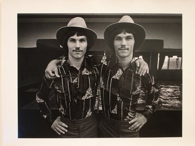 Twin Youths Wearing Hats