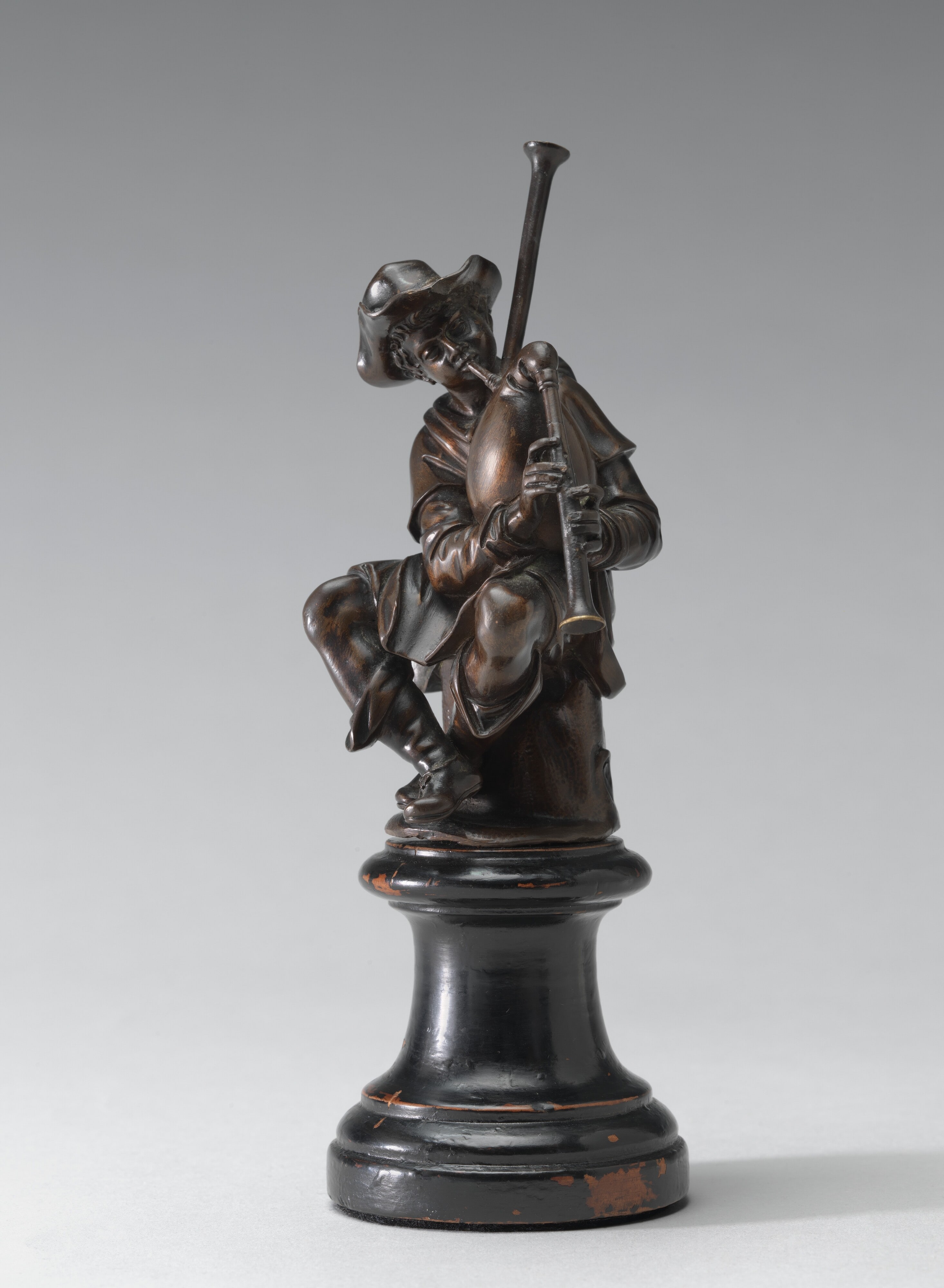 Seated Bagpiper